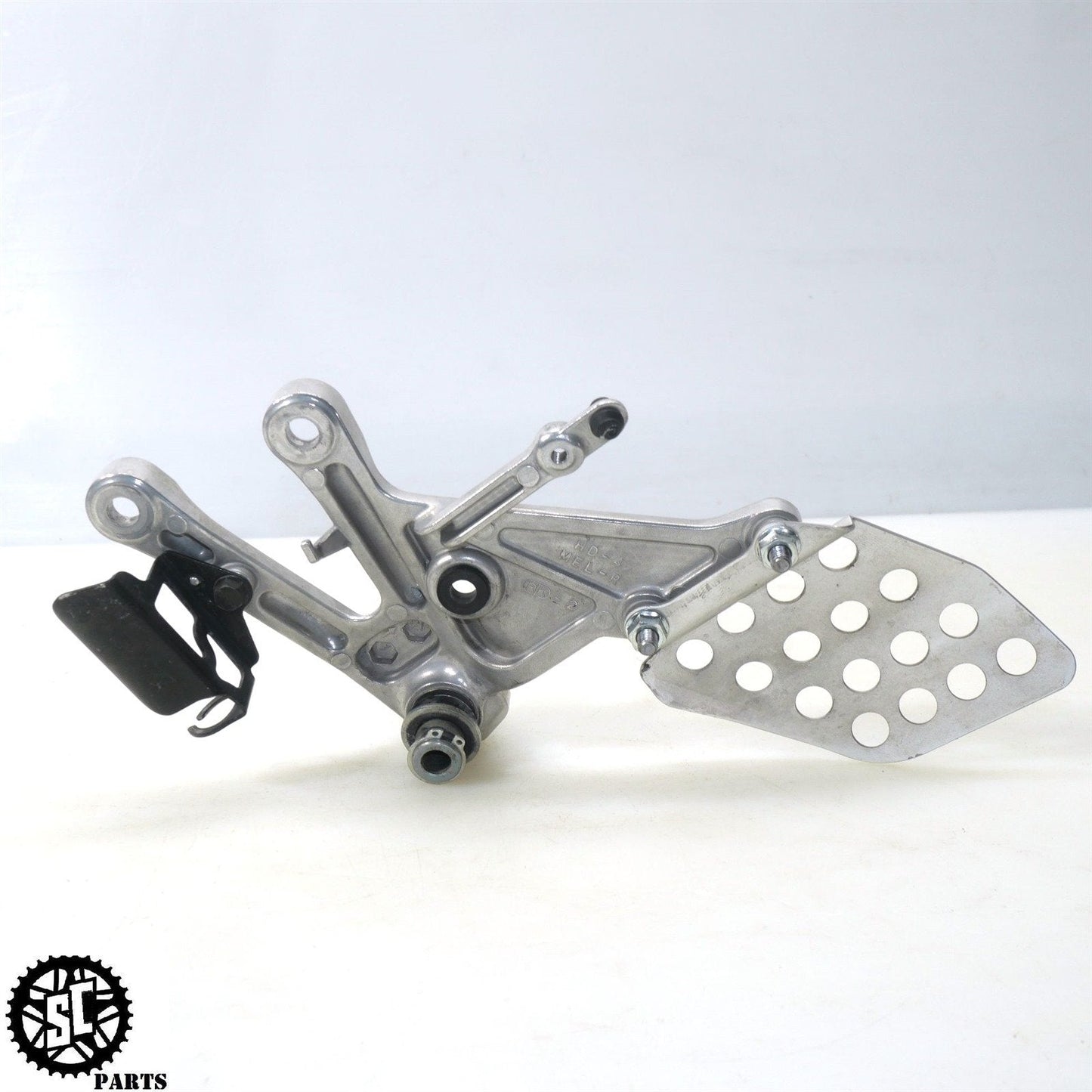 06 07 HONDA CBR1000RR RIGHT REAR SET FRONT FOOT PEG H11 - SALVAGECYCLEPARTS