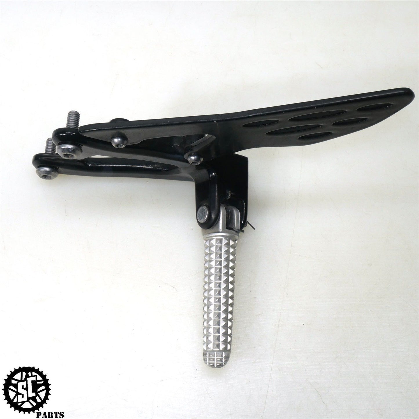 09-14 YAMAHA YZF R1 LEFT REARSET FOOT REST BRACKET Y39