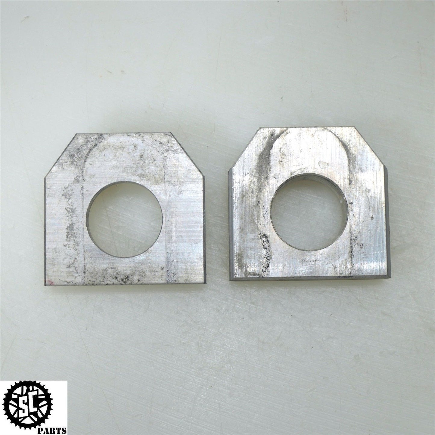 20-23 SUZUKI GSXR 600 750 REAR AXLE BLOCKS CHAIN ADJUSTER S58