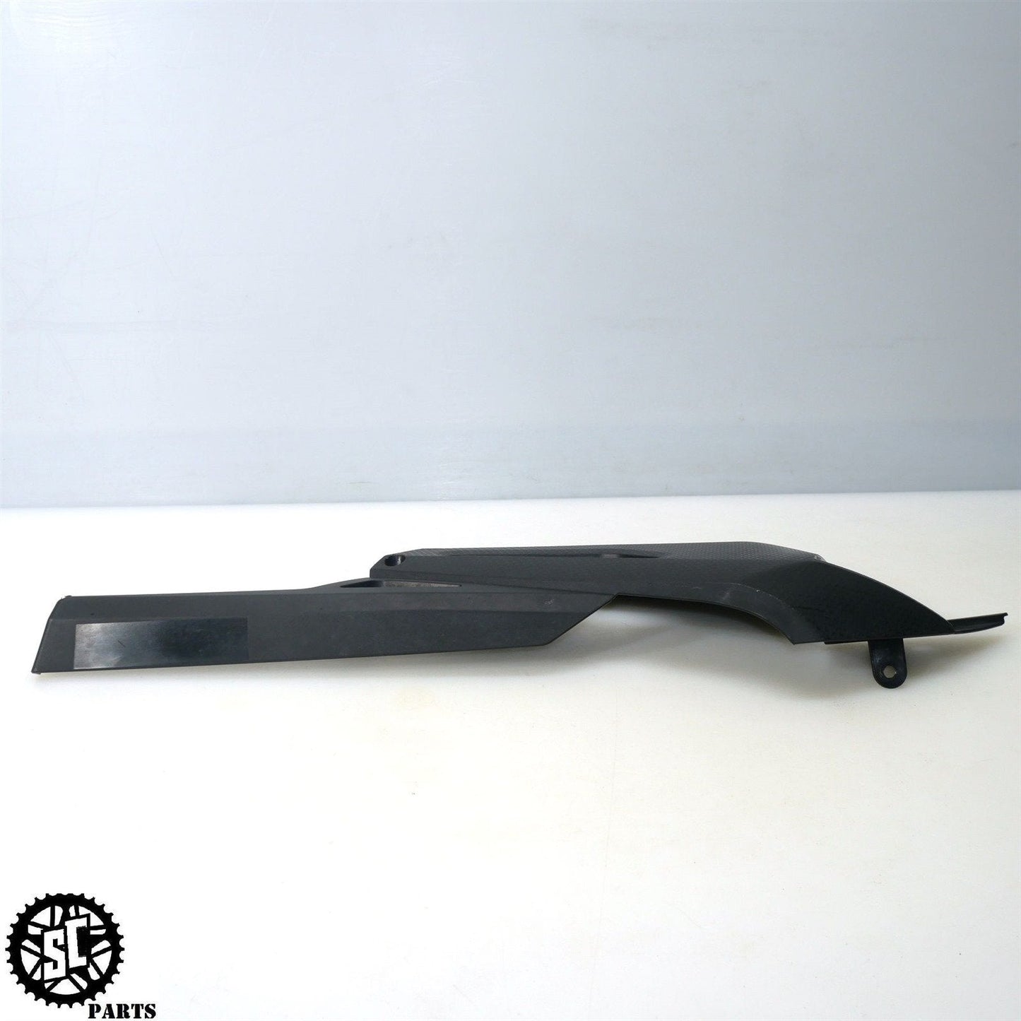 21-23 APRILIA RS660 REAR CHAIN GUARD COVER 2B006389 A08