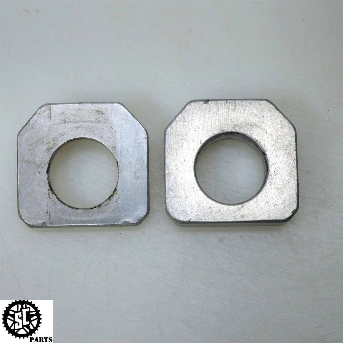 08 09 SUZUKI GSXR 600 REAR AXLE BLOCKS CHAIN ADJUSTER S45