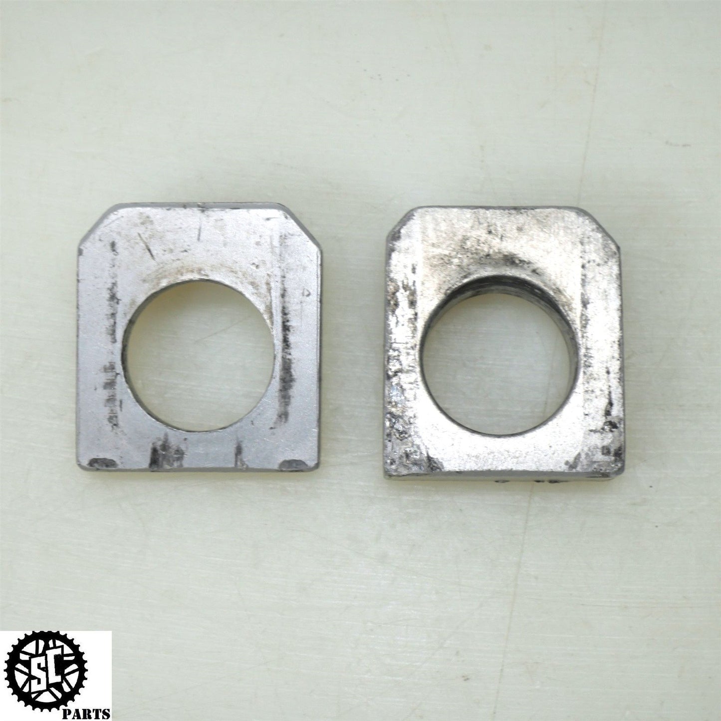 2007 2008 SUZUKI GSXR 1000 REAR SWINGARM AXLE BLOCKS CHAIN ADJUSTER S72