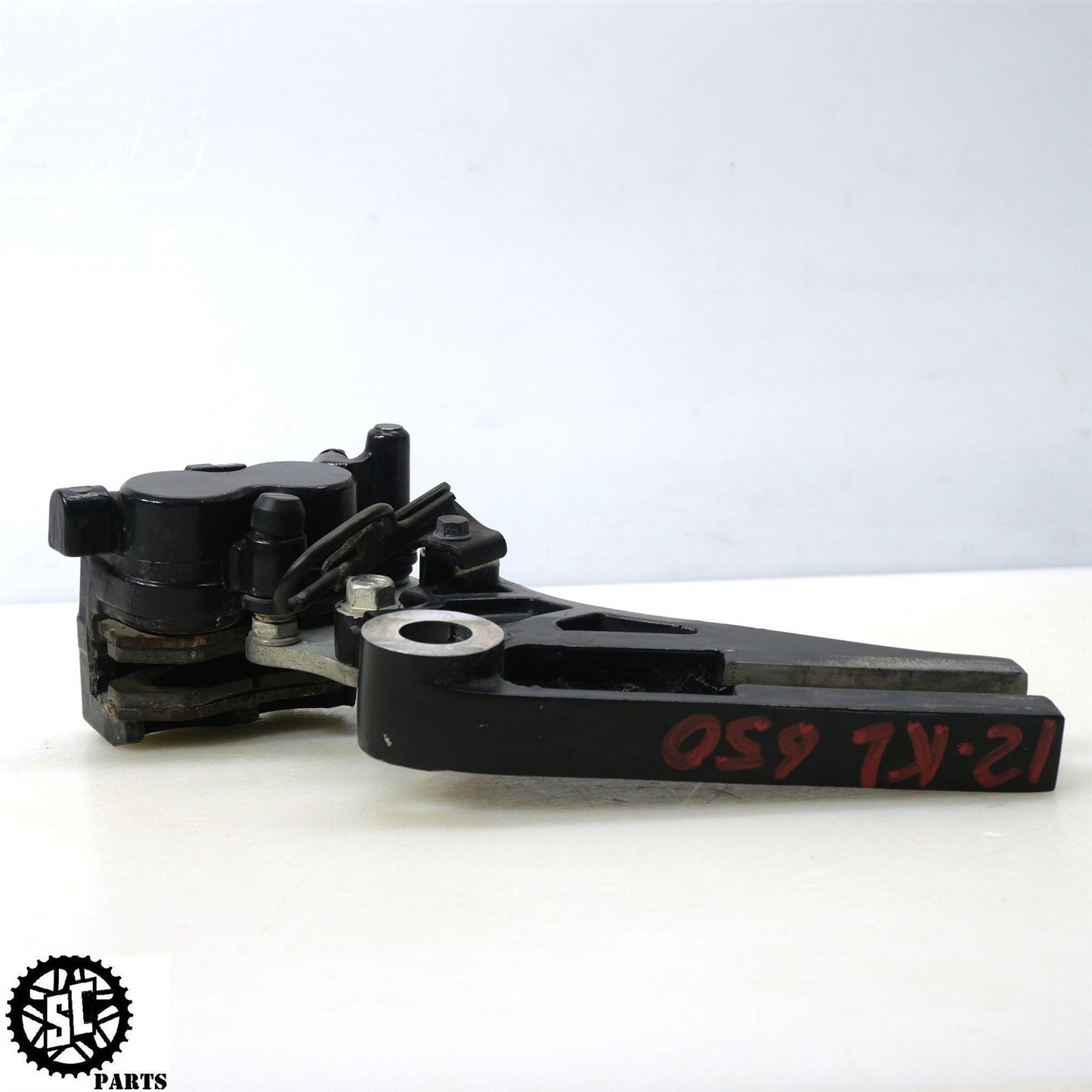 2012 KAWASAKI KLR 650 KL REAR BRAKE CALIPER BRACKET K50
