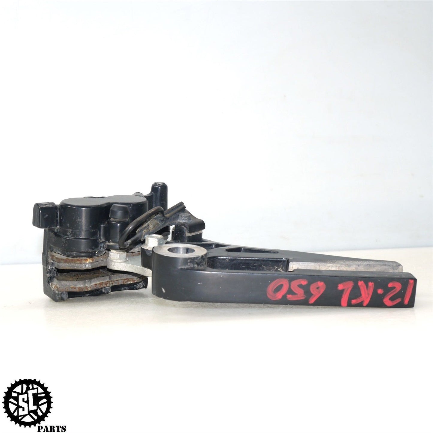 2012 KAWASAKI KLR 650 KL REAR BRAKE CALIPER BRACKET K50