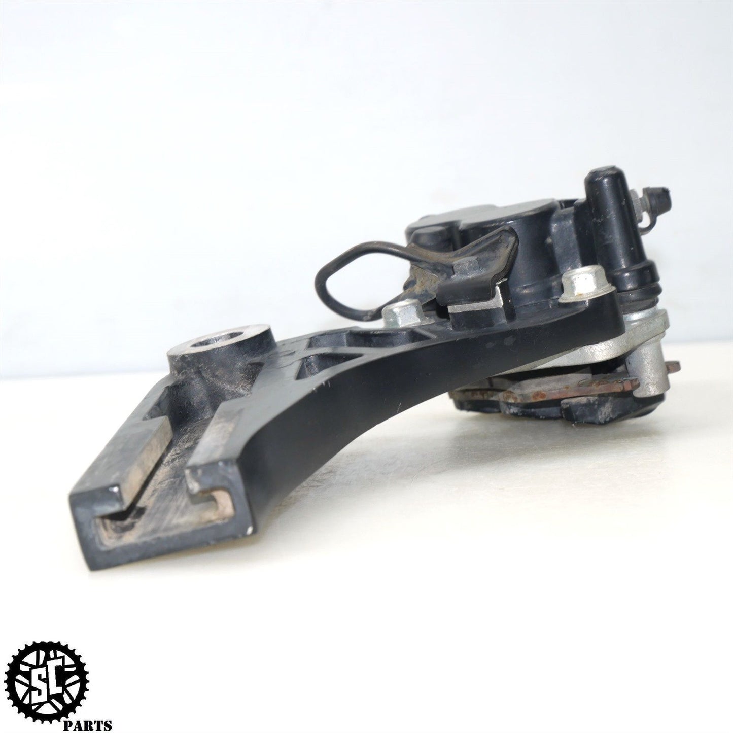 2012 KAWASAKI KLR 650 KL REAR BRAKE CALIPER BRACKET K50