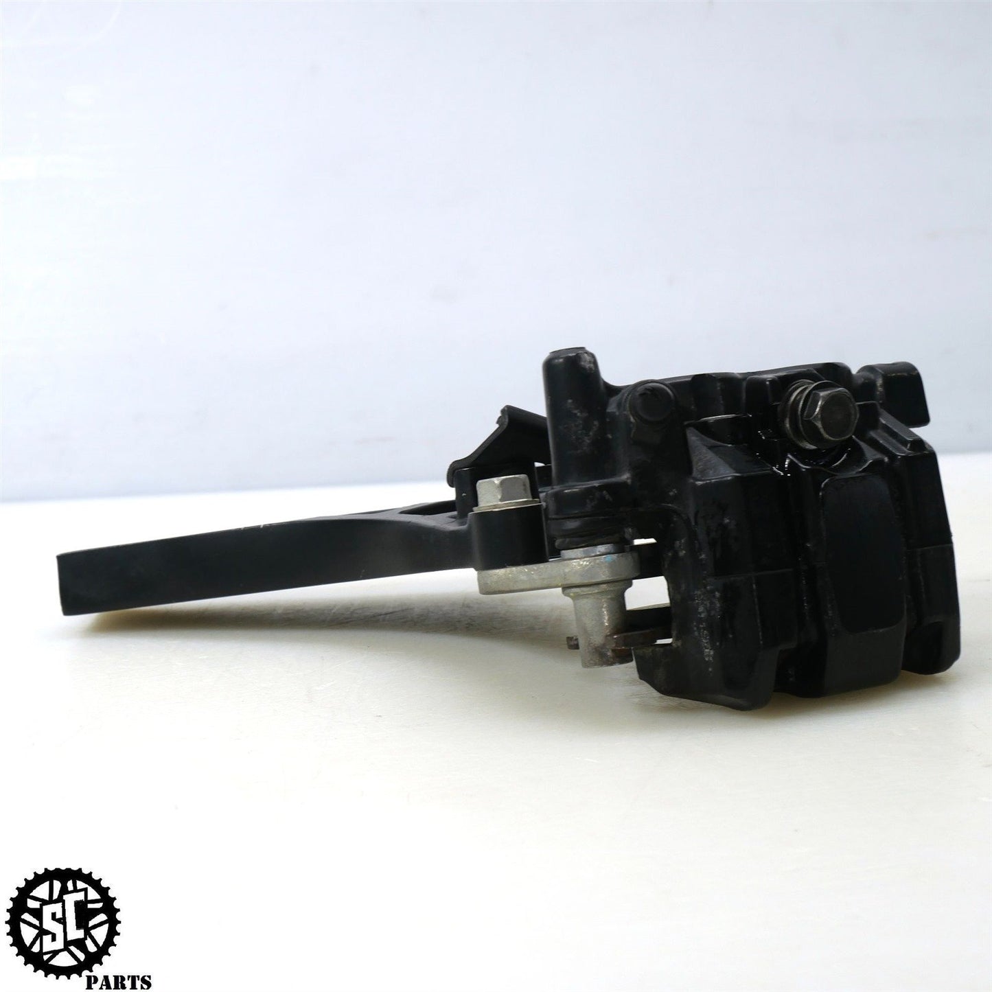 2012 KAWASAKI KLR 650 KL REAR BRAKE CALIPER BRACKET K50