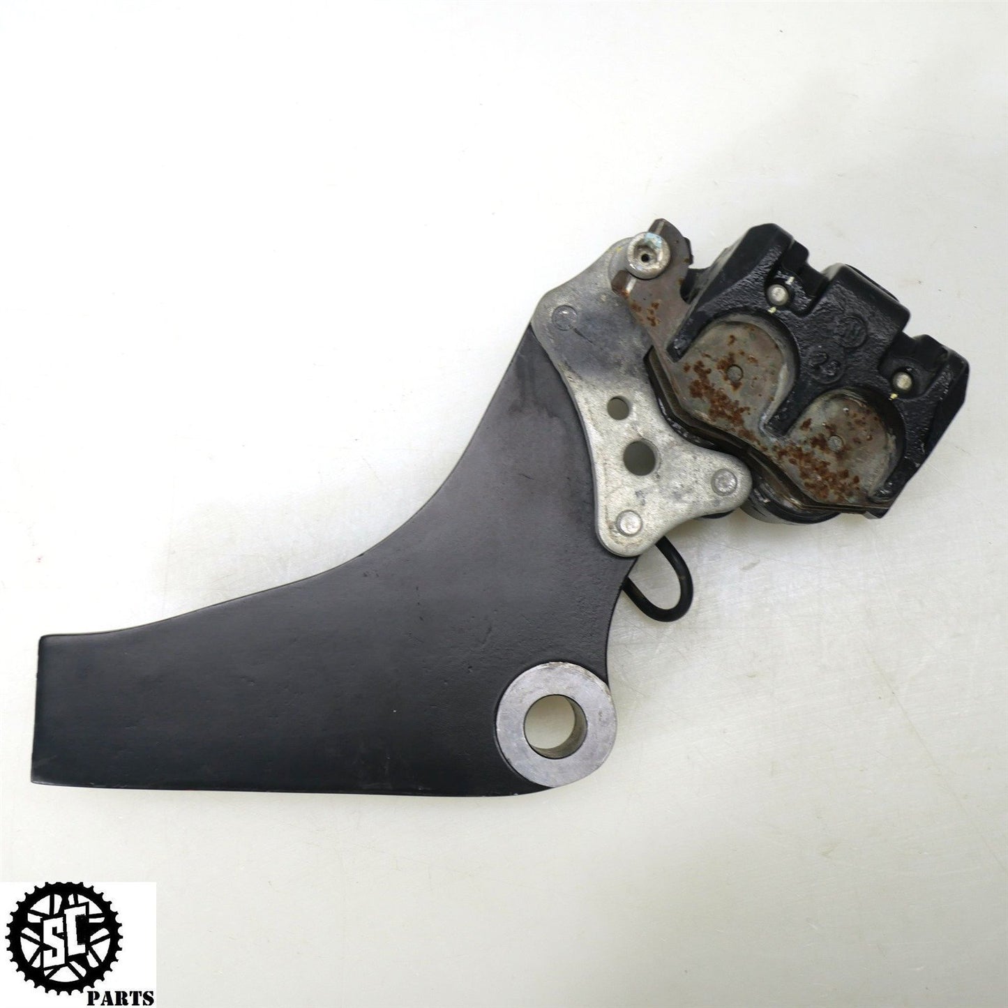 2012 KAWASAKI KLR 650 KL REAR BRAKE CALIPER BRACKET K50