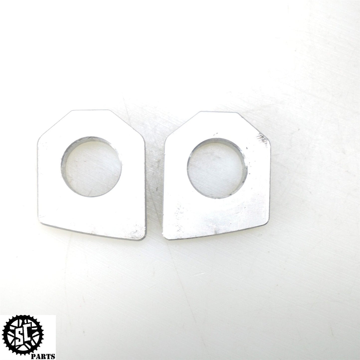 09-12 TRIUMPH STREET TRIPLE 675 SWINGARM CHAIN ADJUSTER AXLE BLOCKS T45