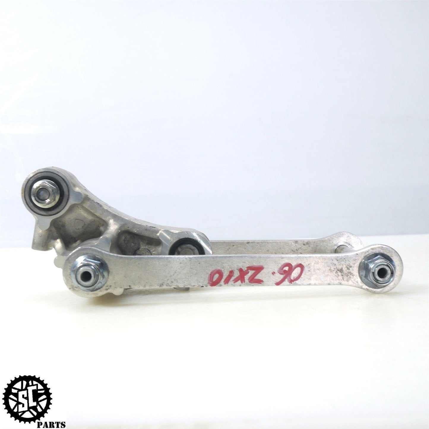 06 07 KAWASAKI NINJA ZX10R SUSPENSION SHOCK LINKAGE DOG BONE LOWERING LINK K65