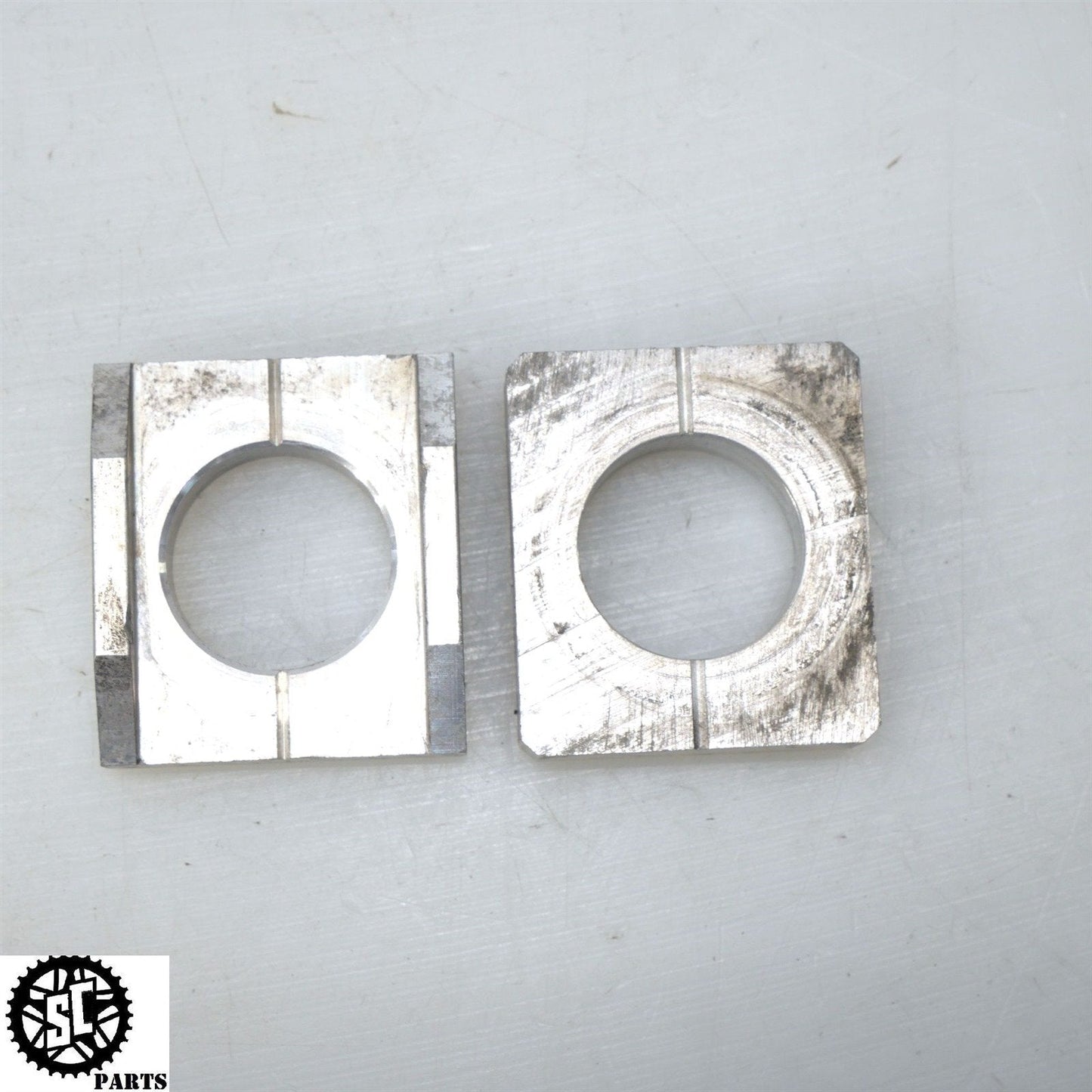 2009-2012 KAWASAKI NINJA ZX6R SWINGARM REAR AXLE CHAIN ADJUSTER BLOCKS K15