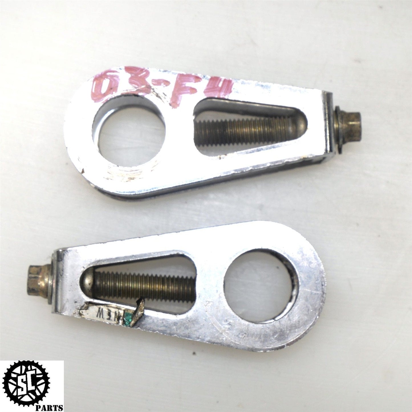 2001-2006 HONDA CBR600 F4i SWINGARM CHAIN ADJUSTER AXLE TENSIONER BLOCKS H29