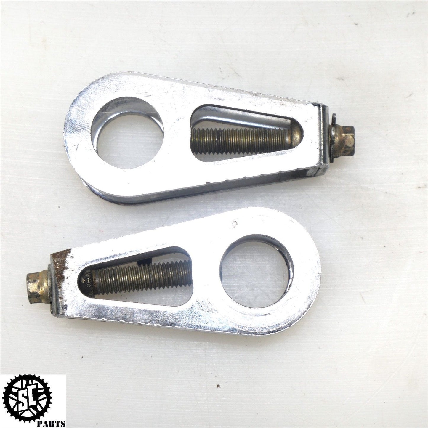 2001-2006 HONDA CBR600 F4i SWINGARM CHAIN ADJUSTER AXLE TENSIONER BLOCKS H29