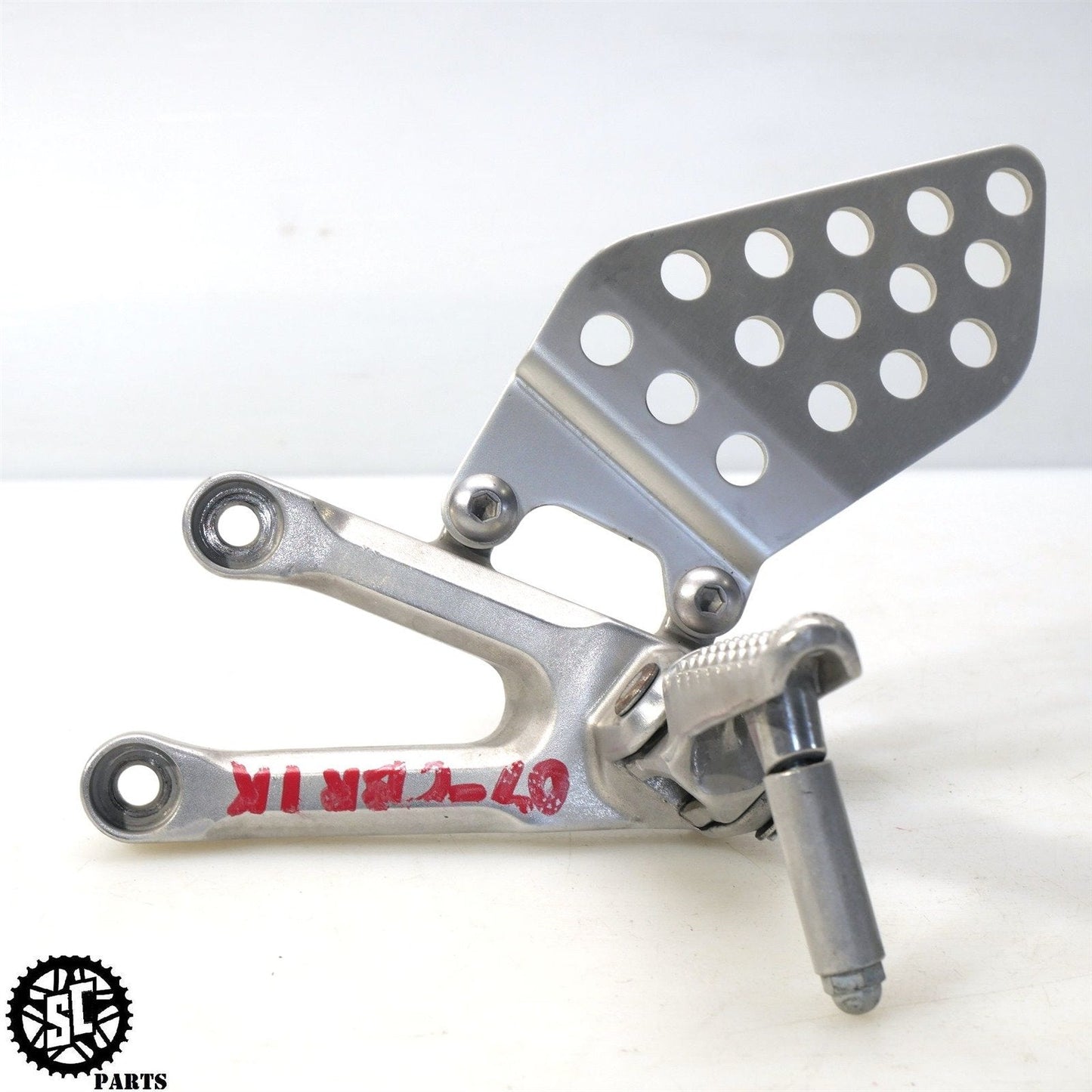 2006 2007 HONDA CBR1000RR FRONT LEFT REARSET FOOT PEG BRACKET H11