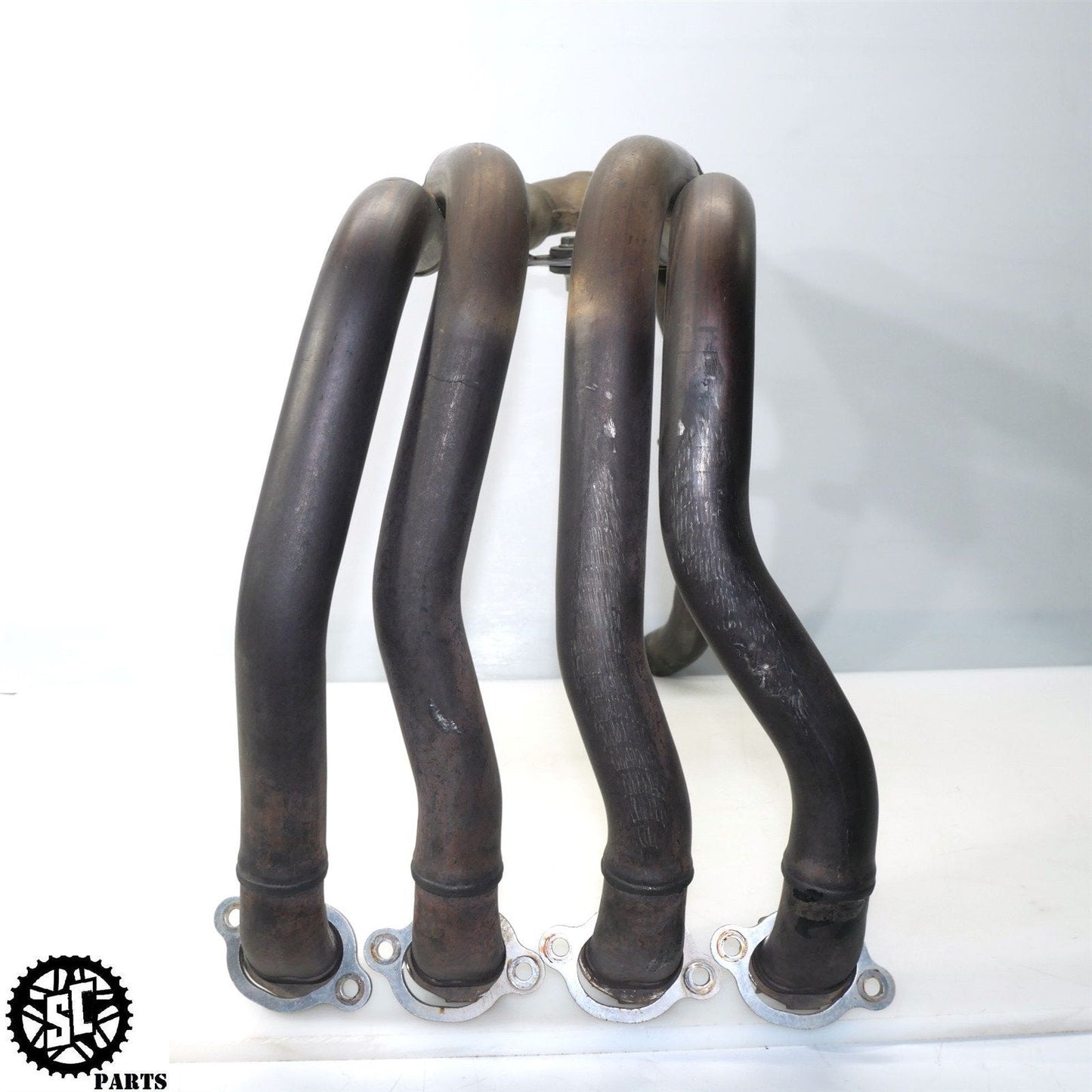 04 - 05 2005 HONDA CBR1000RR EXHAUST HEADER PIPE H19 - SALVAGECYCLEPARTS