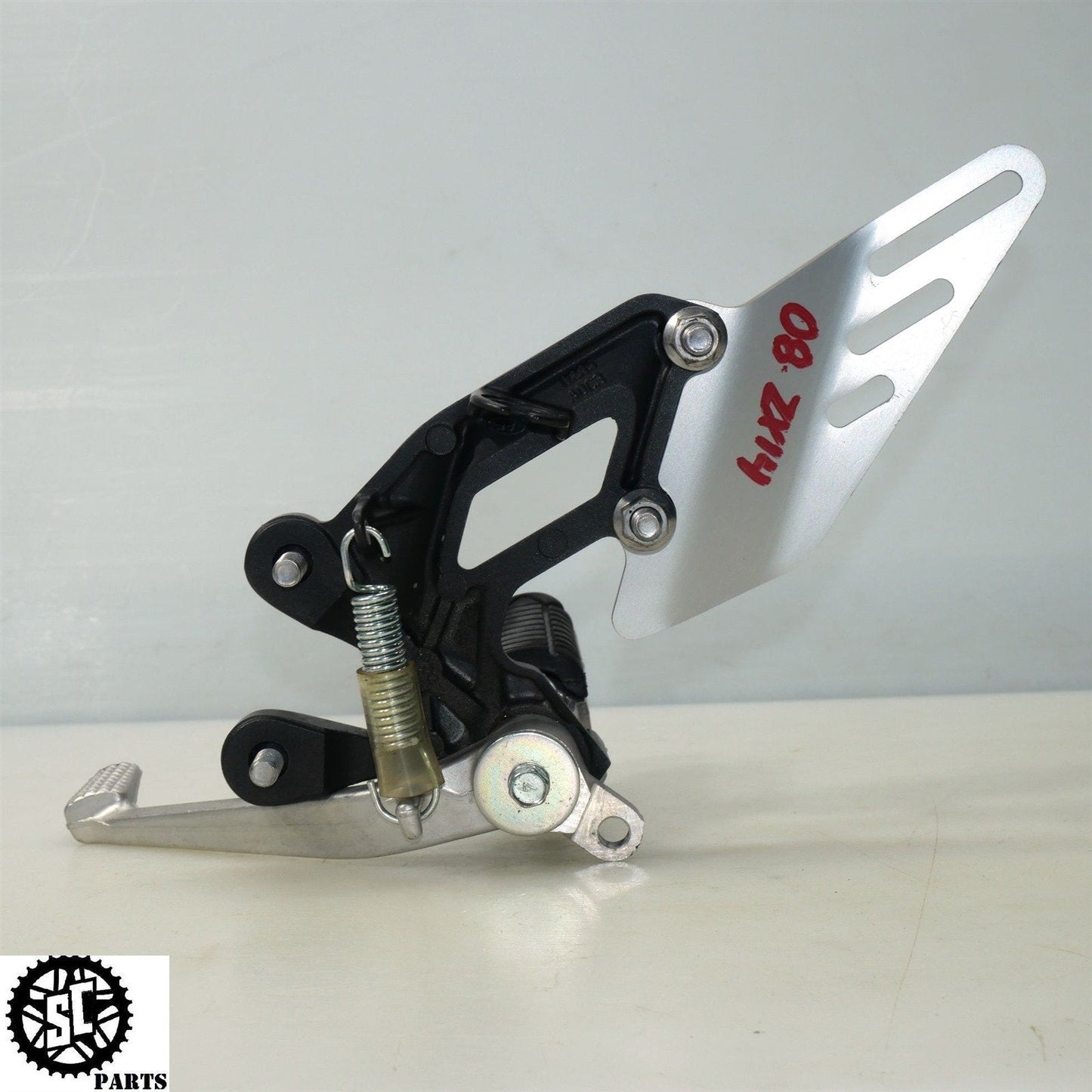 06 07 2008 - 2011 KAWASAKI ZX14 RIGHT REARSET FOOT PEG BRACKET K48 - SALVAGECYCLEPARTS