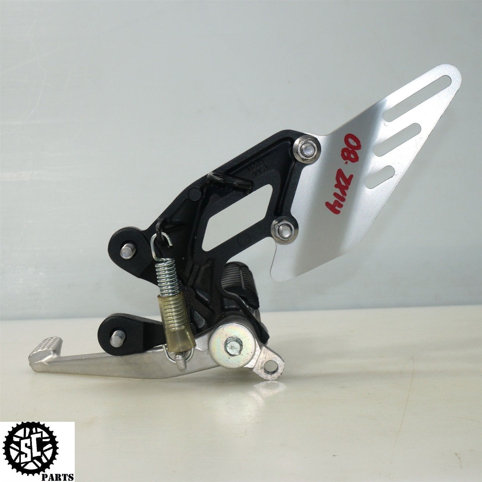 06 07 2008 - 2011 KAWASAKI ZX14 RIGHT REARSET FOOT PEG BRACKET K48 - SALVAGECYCLEPARTS