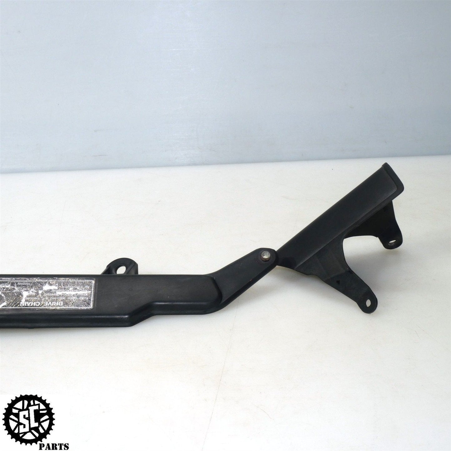 06 07 HONDA CBR1000RR CHAIN GUARD COVER H32 - SALVAGECYCLEPARTS