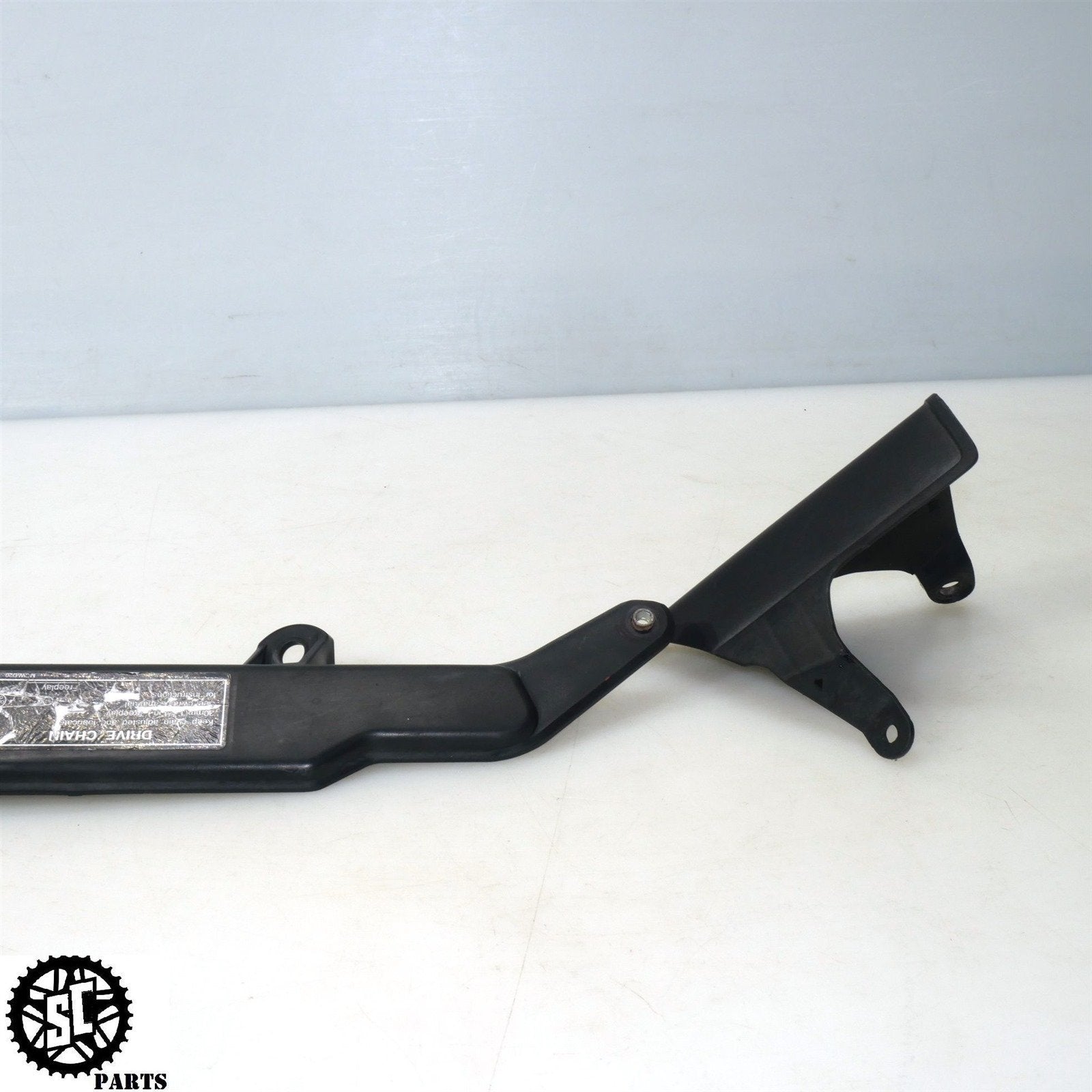 06 07 HONDA CBR1000RR CHAIN GUARD COVER H32 - SALVAGECYCLEPARTS