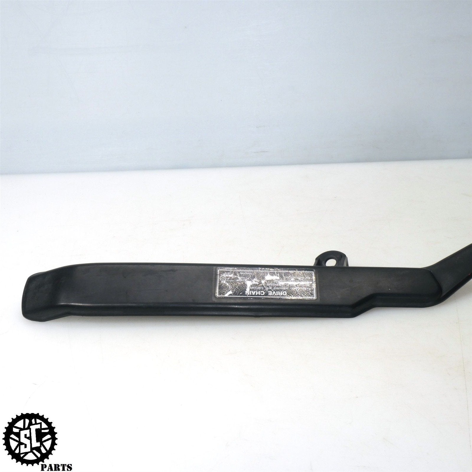 06 07 HONDA CBR1000RR CHAIN GUARD COVER H32 - SALVAGECYCLEPARTS