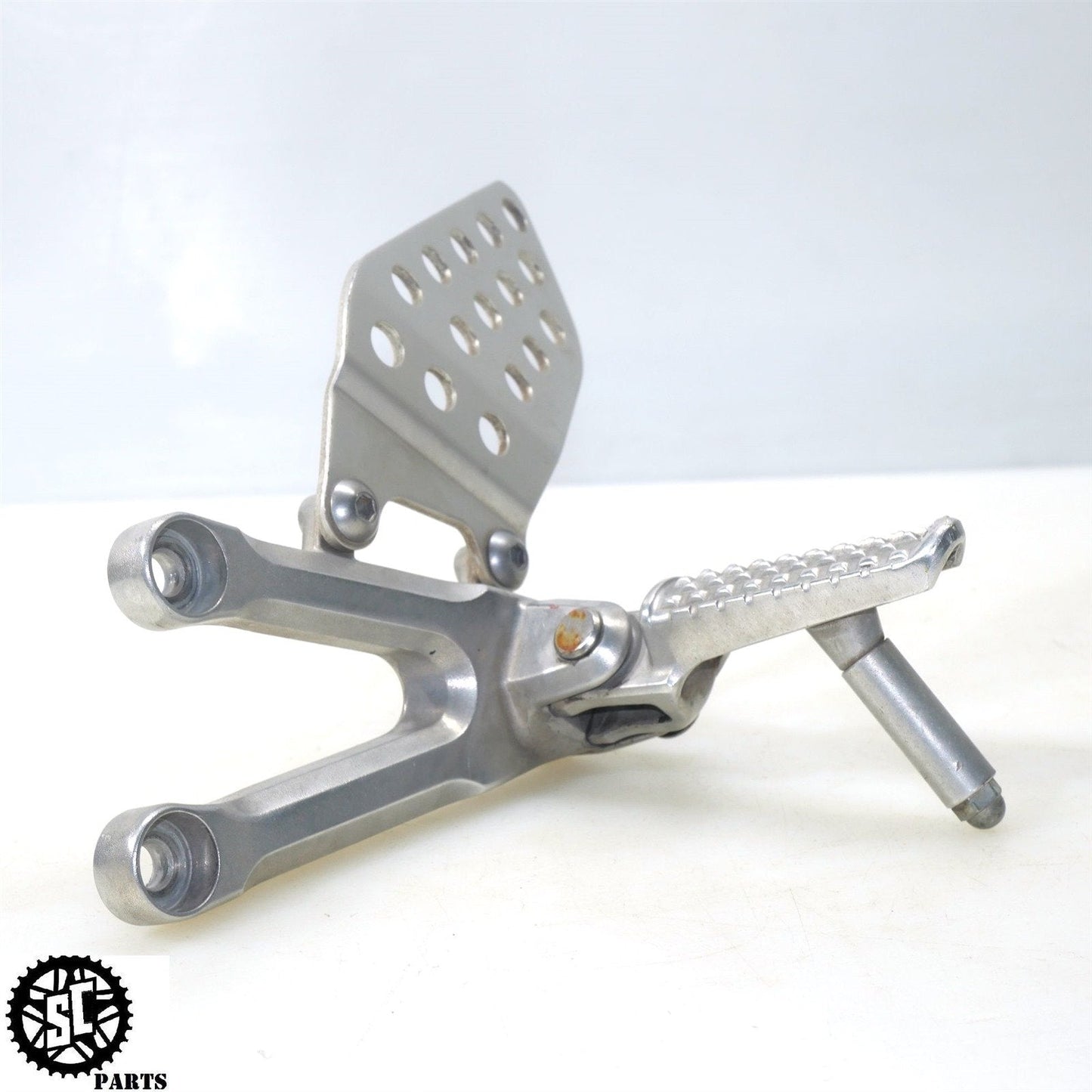 06 07 HONDA CBR1000RR LEFT REAR SET FRONT FOOT PEG H11 - SALVAGECYCLEPARTS