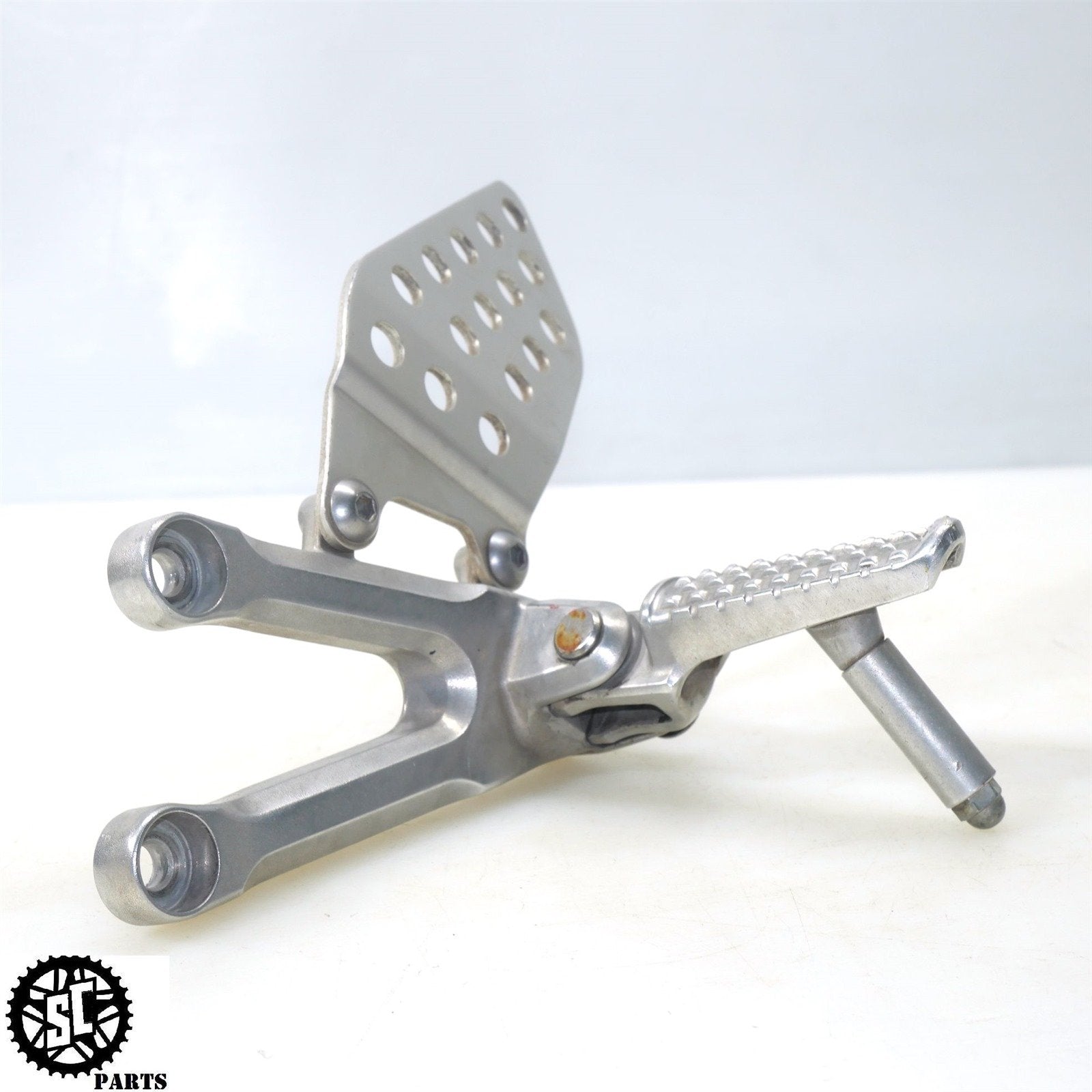 06 07 HONDA CBR1000RR LEFT REAR SET FRONT FOOT PEG H11 - SALVAGECYCLEPARTS
