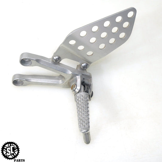 06 07 HONDA CBR1000RR LEFT REAR SET FRONT FOOT PEG H11 - SALVAGECYCLEPARTS
