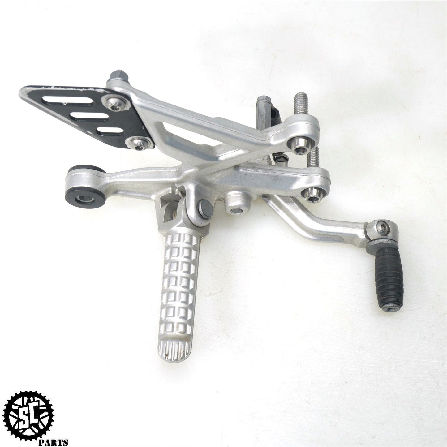 15-16 APRILIA TUONO V4 1100 RIGHT REARSET BRAKE PEDAL BRACKET A07