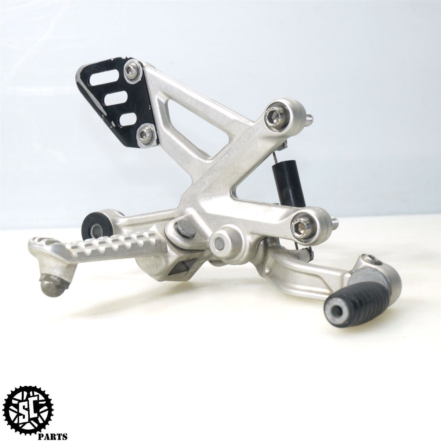 15-16 APRILIA TUONO V4 1100 RIGHT REARSET BRAKE PEDAL BRACKET A07