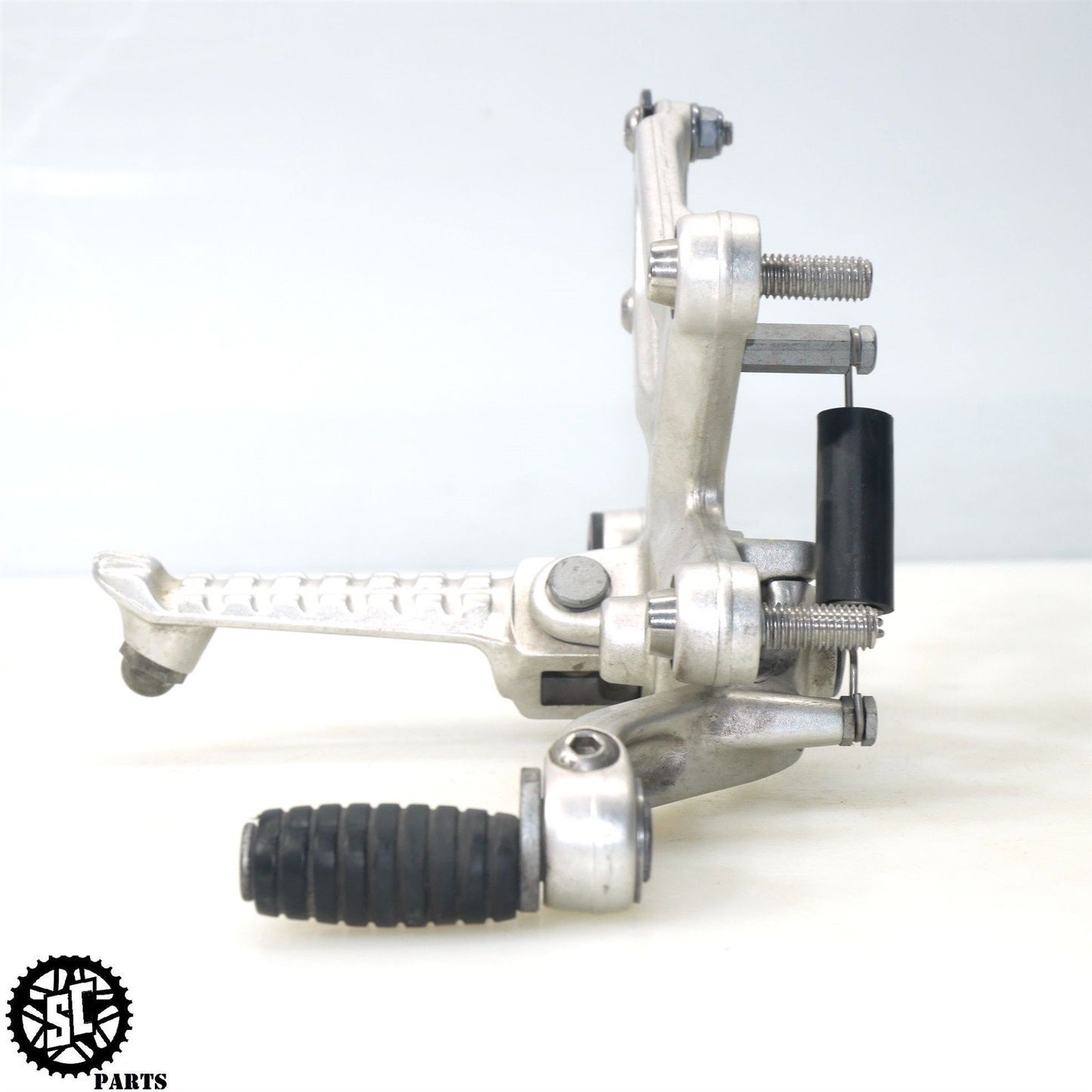 15-16 APRILIA TUONO V4 1100 RIGHT REARSET BRAKE PEDAL BRACKET A07