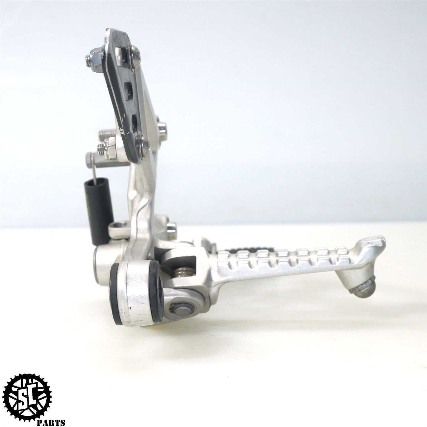 15-16 APRILIA TUONO V4 1100 RIGHT REARSET BRAKE PEDAL BRACKET A07