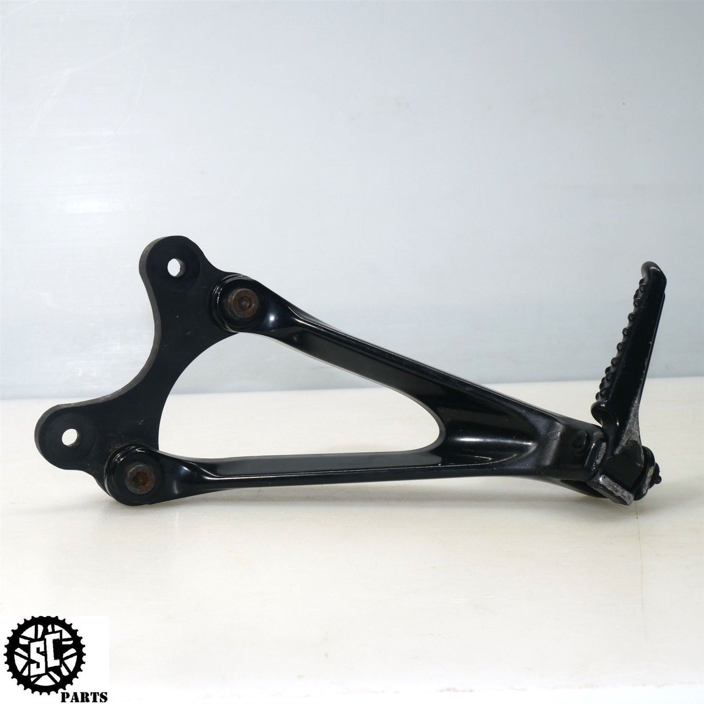 12-16 HONDA CBR1000RR LEFT REAR PASSENGER FOOT PEG H28