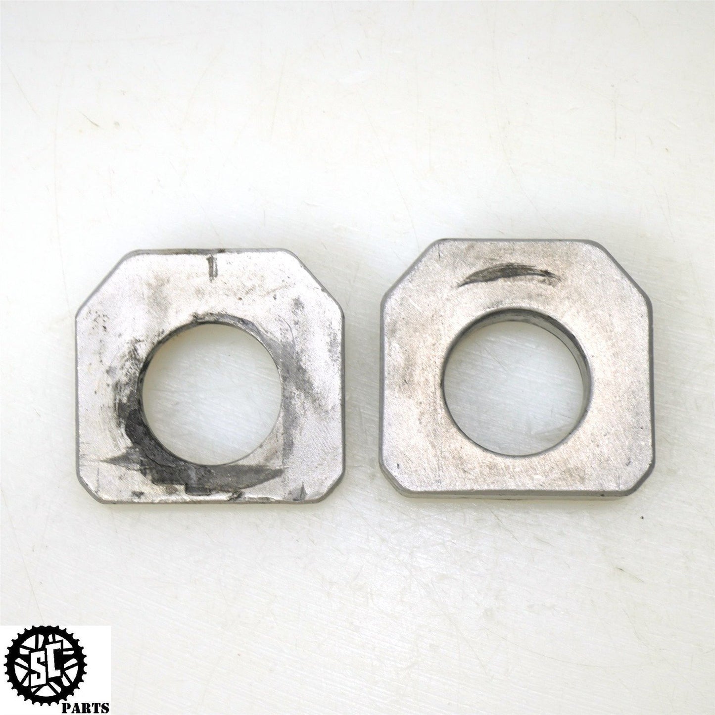 2007 SUZUKI GSXR 600 REAR AXLE BLOCKS CHAIN ADJUSTER S67