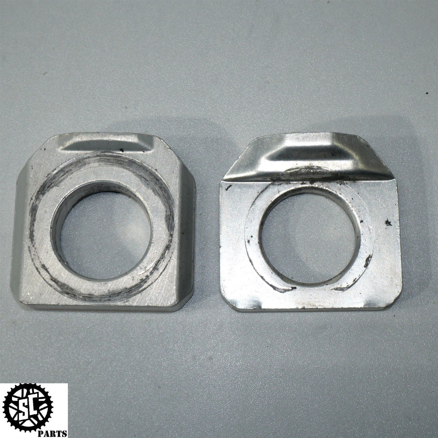 2007 SUZUKI GSXR 750 REAR AXLE BLOCKS CHAIN ADJUSTER S45