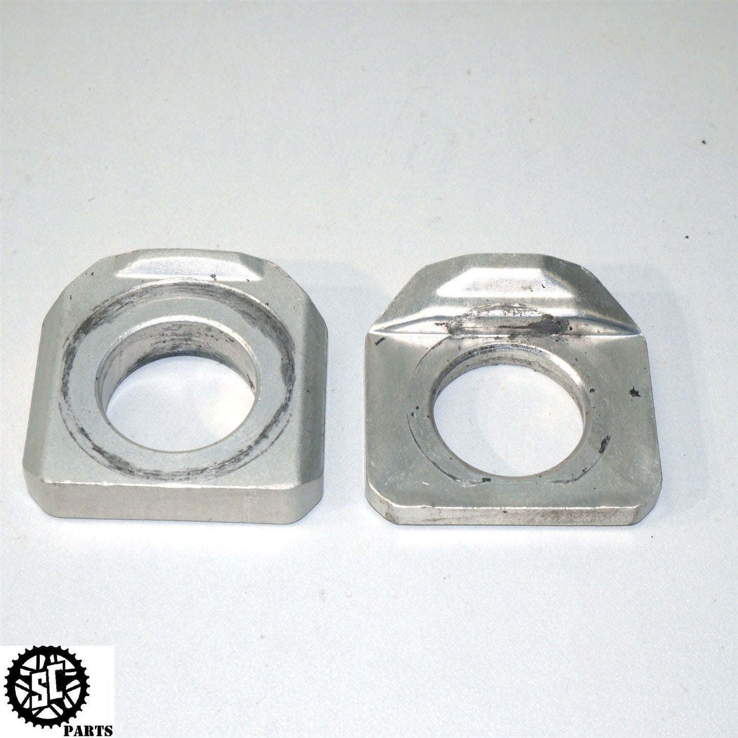 2007 SUZUKI GSXR 750 REAR AXLE BLOCKS CHAIN ADJUSTER S45