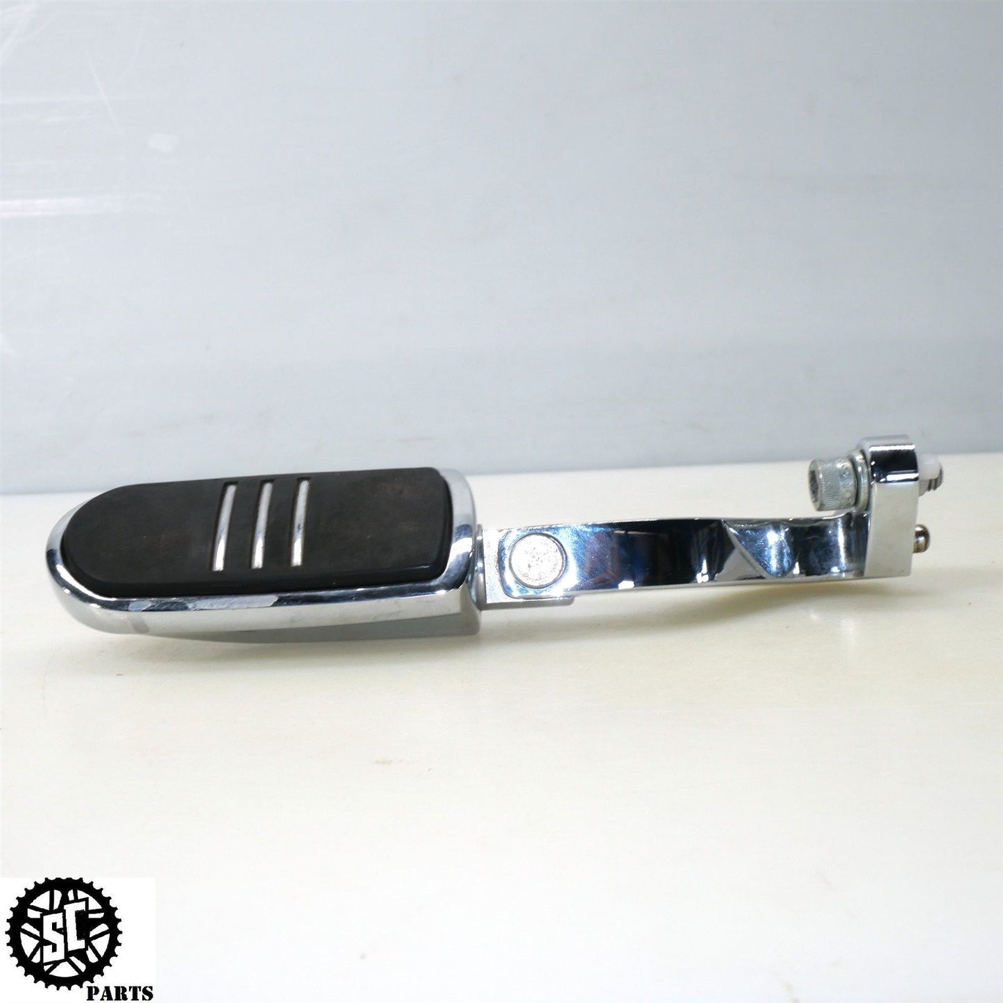 2008 HARLEY DAVIDSON STREET GLIDE REAR PASSENGER FOOT PEG BRACKET CHROME HD57