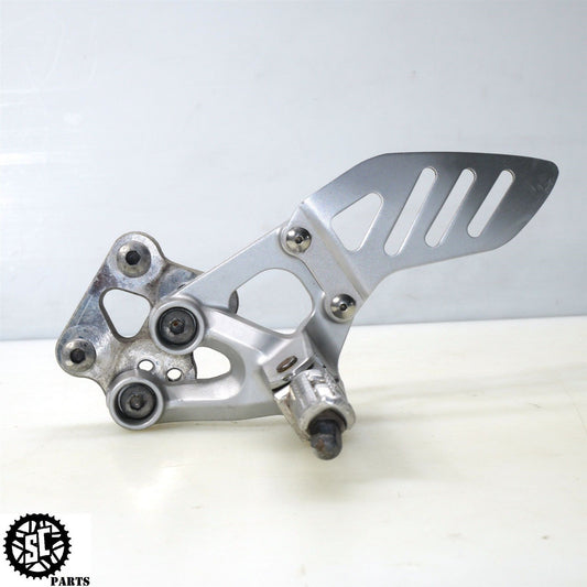 06 07 SUZUKI GSXR 750 LEFT REARSET BRACKET S64