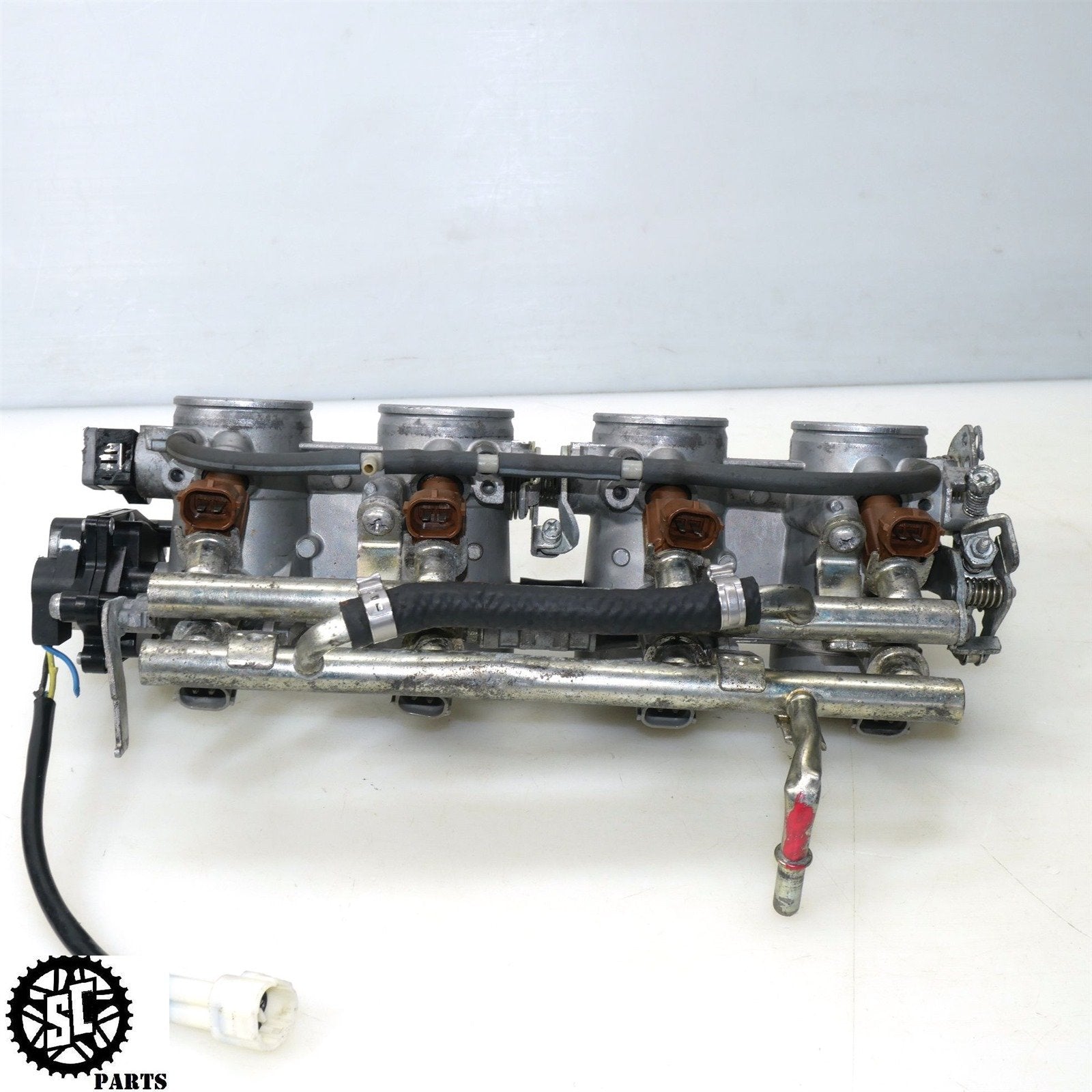 2006-2007 SUZUKI GSXR 750 THROTTLE BODY S64 – SALVAGECYCLEPARTS 2006-2007 SUZUKI GSXR 750 THROTTLE BODY S64 – SALVAGECYCLEPARTS