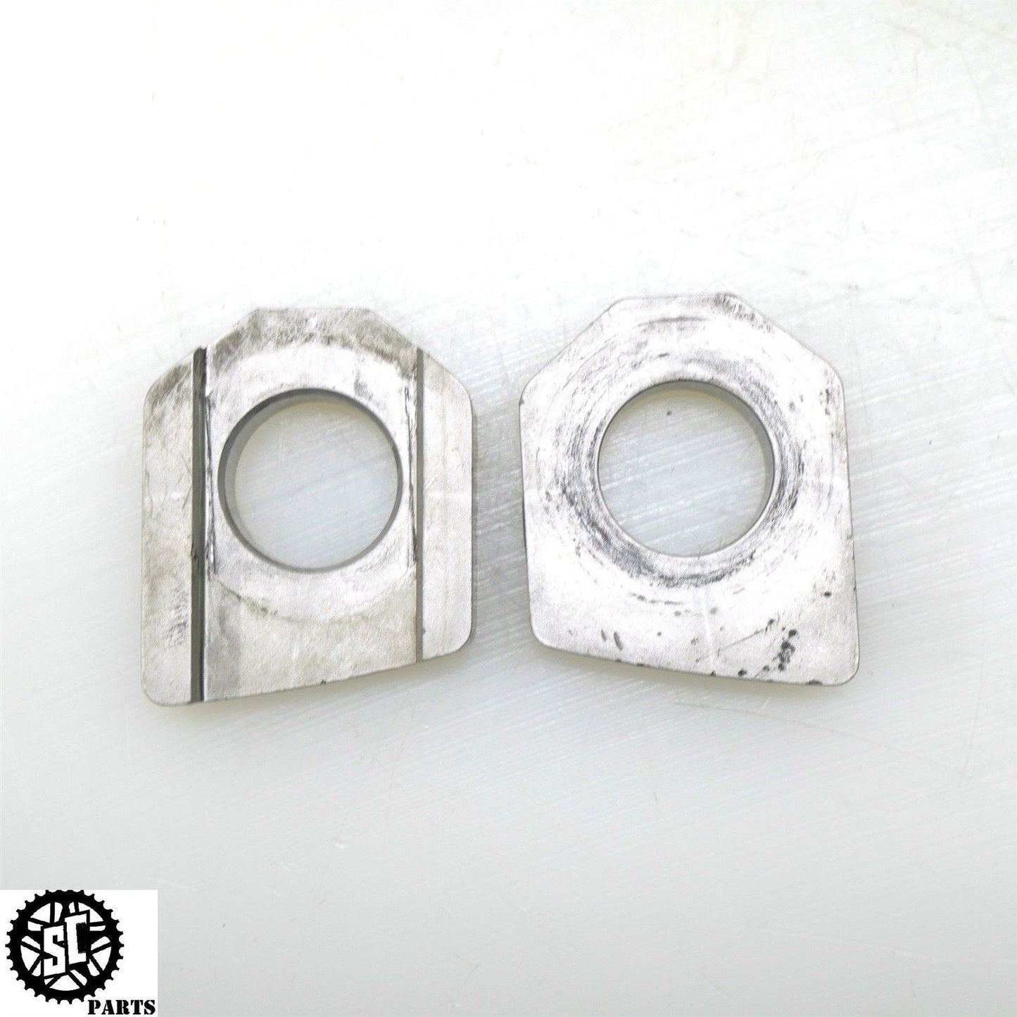 2006-2008 TRIUMPH DAYTONA 675 SWINGARM CHAIN AXLE BLOCK T20