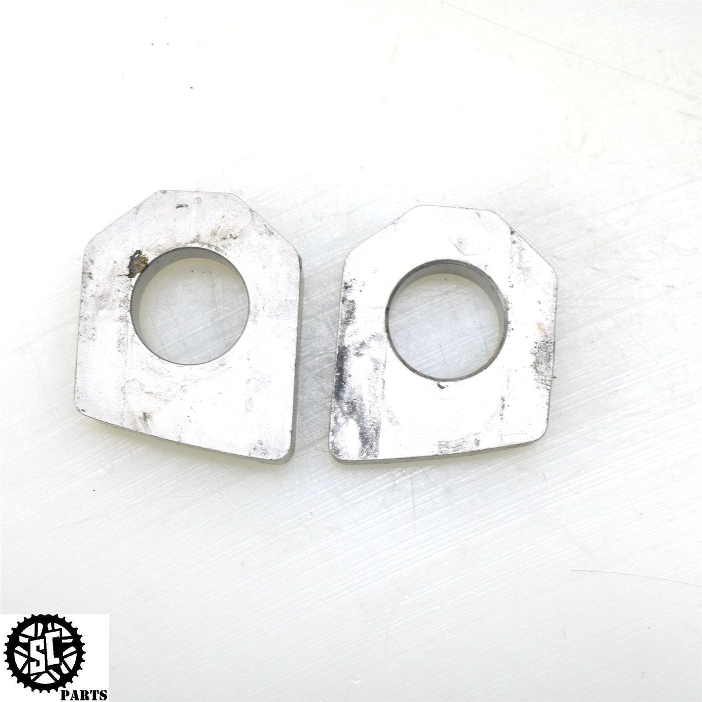 2006-2008 TRIUMPH DAYTONA 675 SWINGARM CHAIN AXLE BLOCK T20