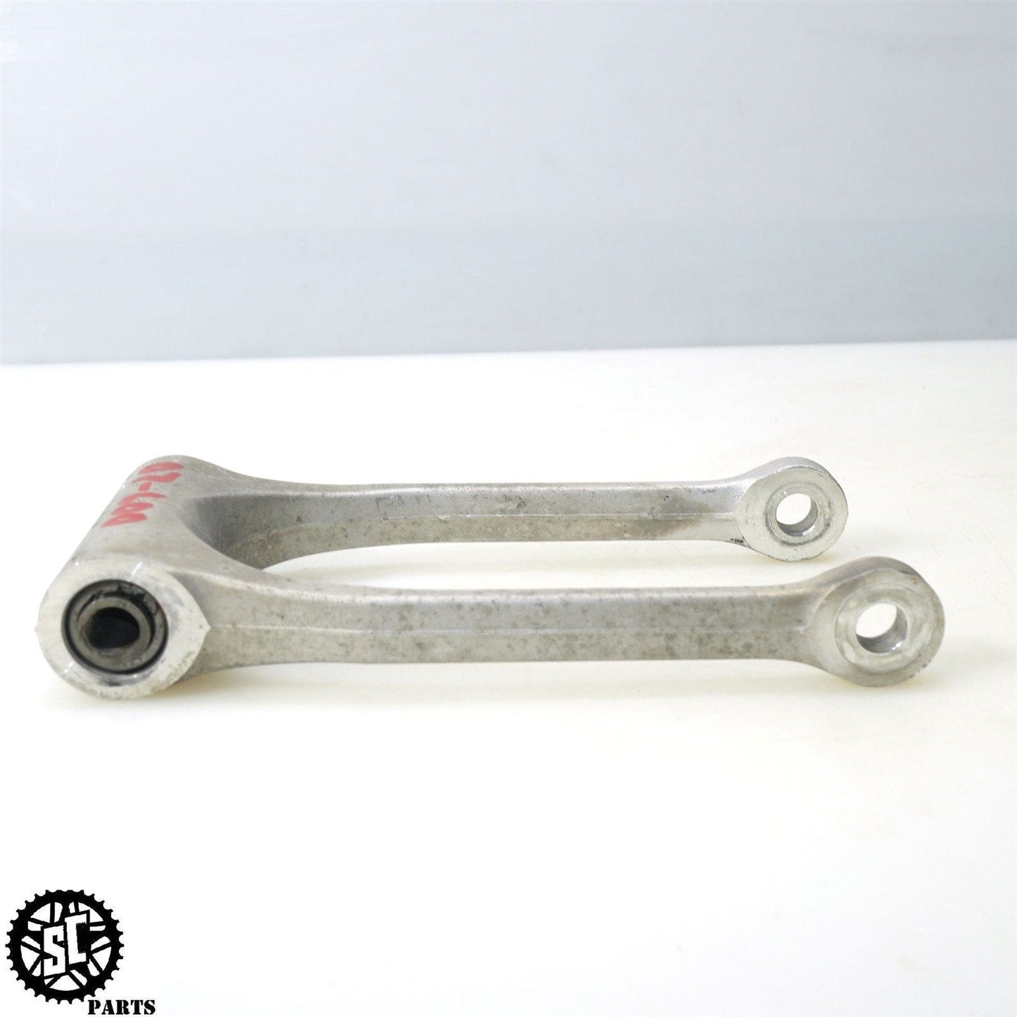06 07 SUZUKI GSXR 600 REAR SHOCK SUSPENSION LINKAGE DOG BONE LINK S03