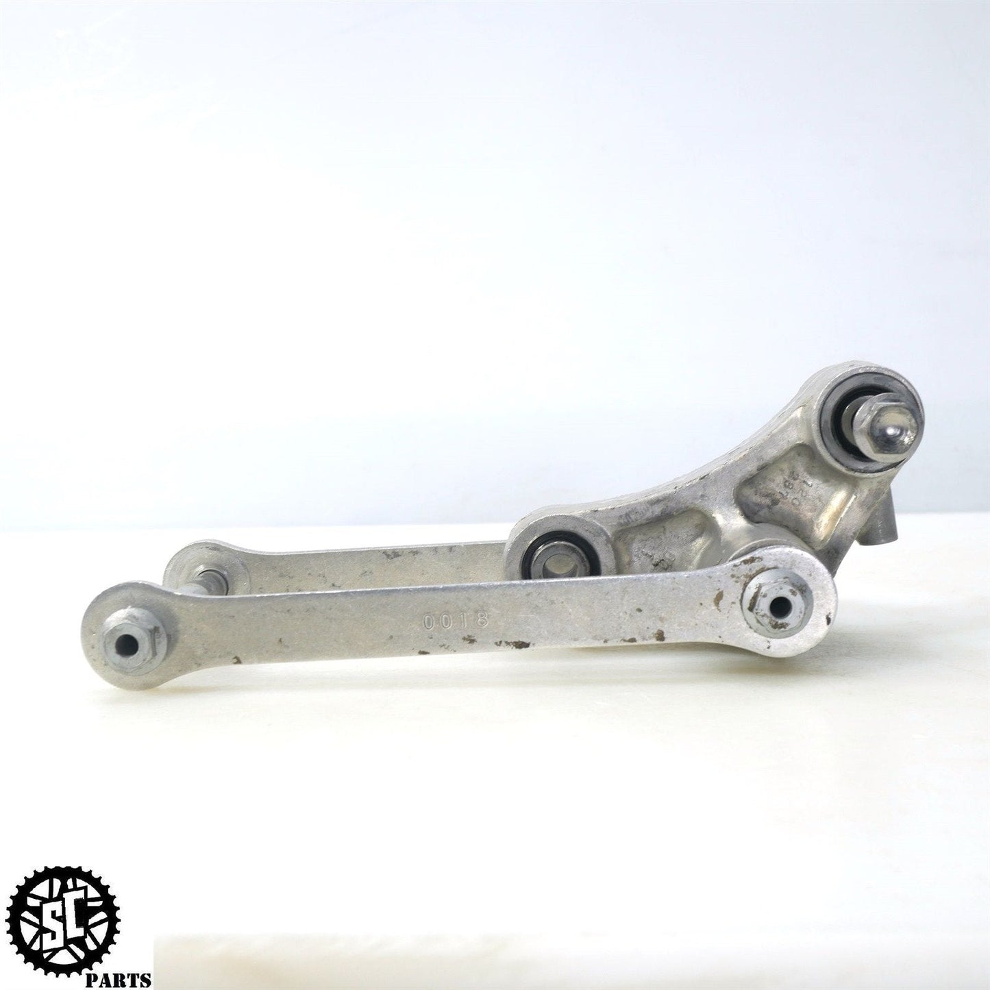 06 07 KAWASAKI NINJA ZX10R SUSPENSION SHOCK LINKAGE DOG BONE LOWERING LINK K65