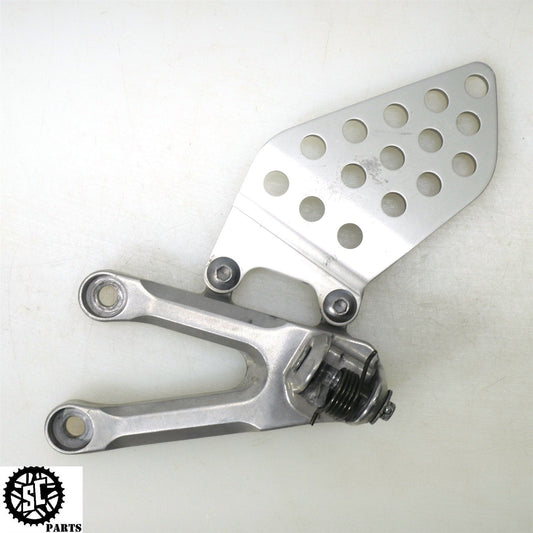 2004 HONDA CBR1000RR LEFT REARSET FOOT PEG BRACKET H24