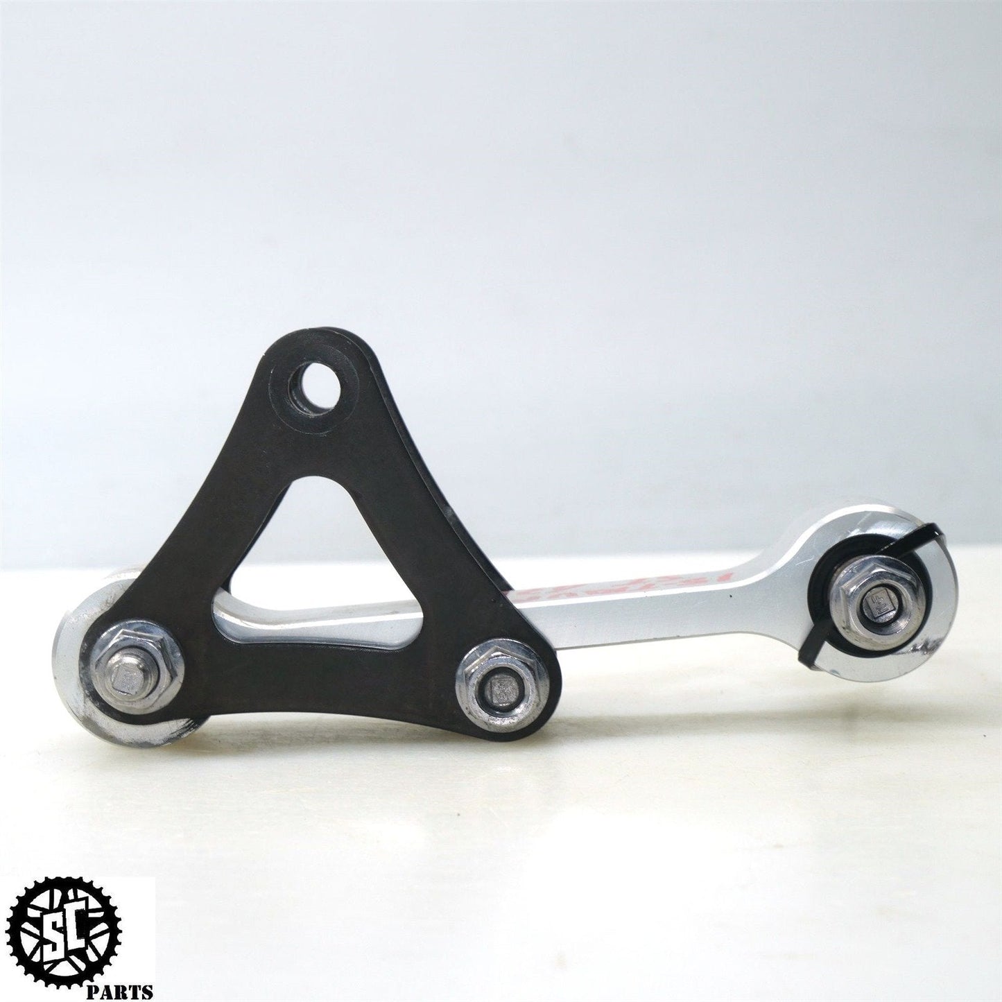 2015 TRIUMPH STREET TRIPLE 675 REAR SHOCK SUSPENSION LINKAGE DOG BONE T22