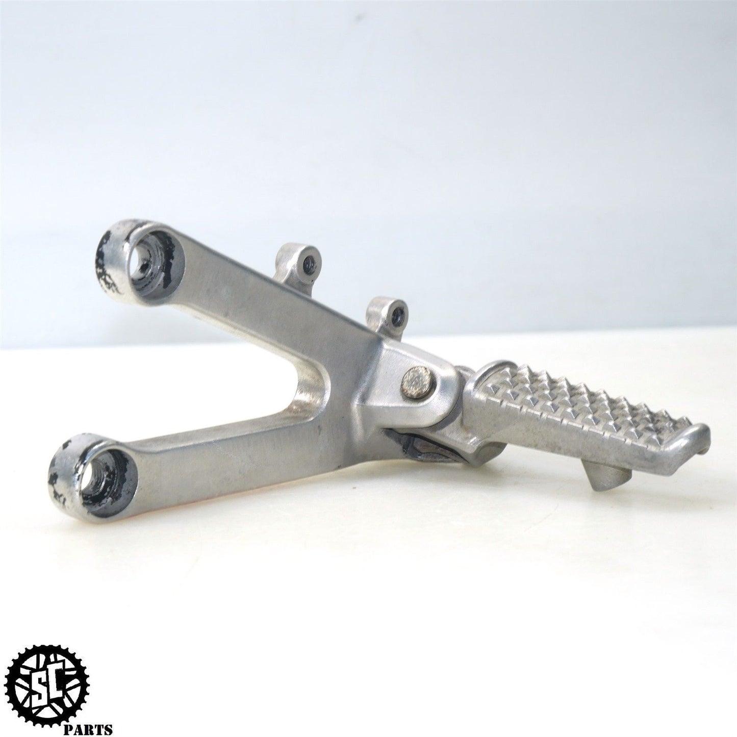 2003-2004 HONDA CBR 600RR LEFT REARSET FRONT FOOT PEG H11
