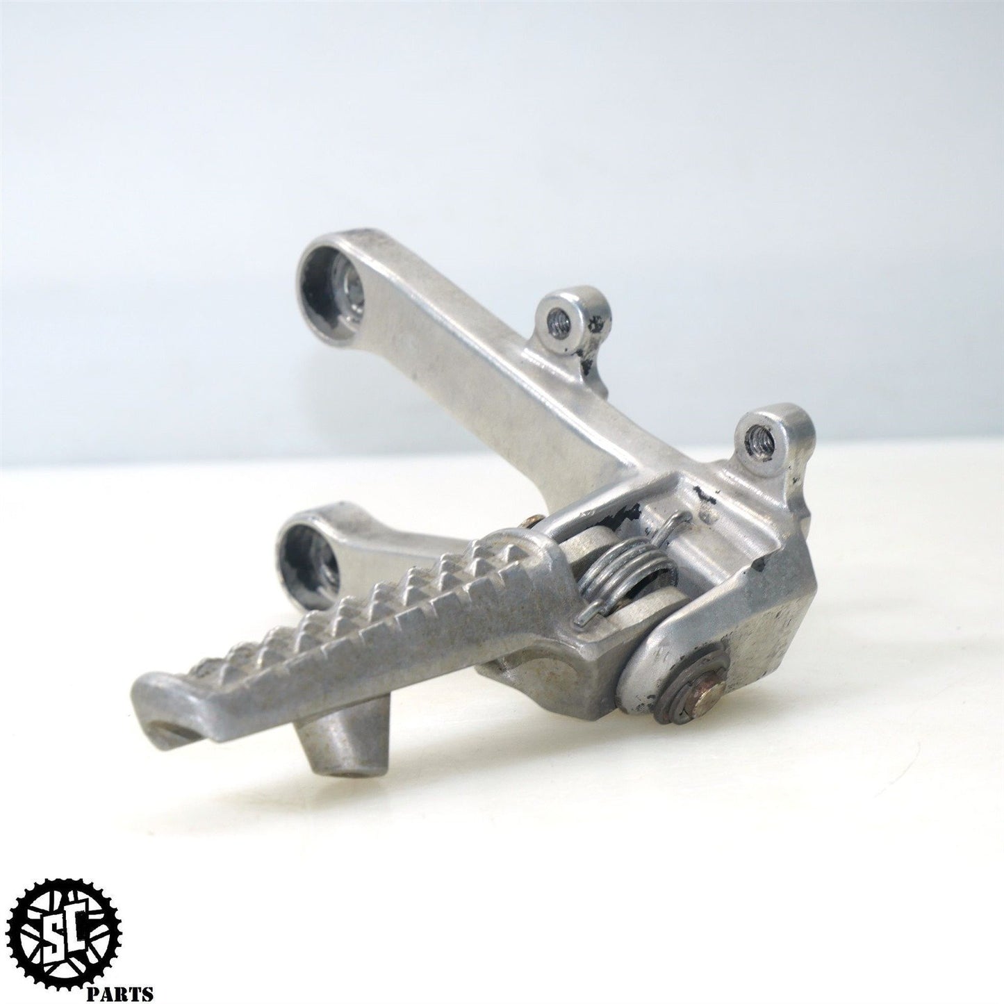 2003-2004 HONDA CBR 600RR LEFT REARSET FRONT FOOT PEG H11